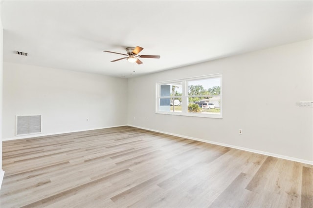 315 Dorchester Dr, Venice, FL 34293 - unfurnished room with ceiling fan, light wood finished floors, and baseboards