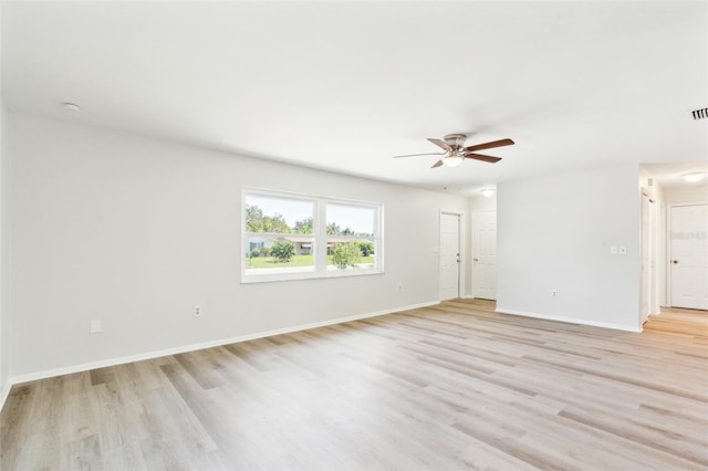 315 Dorchester Dr, Venice, FL 34293 - spare room with light wood-style flooring, ceiling fan, and baseboards