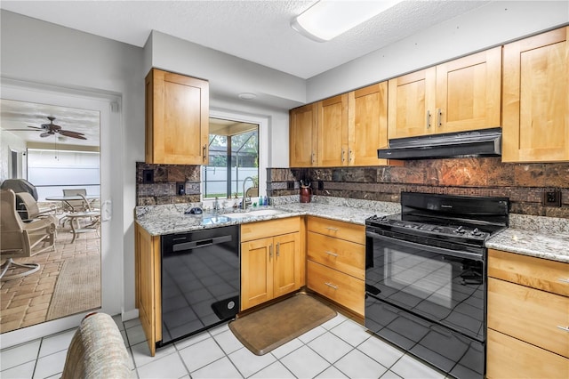 9674 104th Ave, Largo, FL 33773 - kitchen featuring black appliances, under cabinet range hood, a sink, tasteful backsplash, and light stone counters