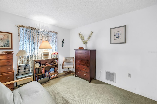 9674 104th Ave, Largo, FL 33773 - living area with carpet flooring and a textured ceiling