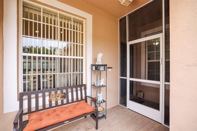 31108 Whitlock Dr, Wesley Chapel, FL 33543 - doorway to property with stucco siding and covered porch