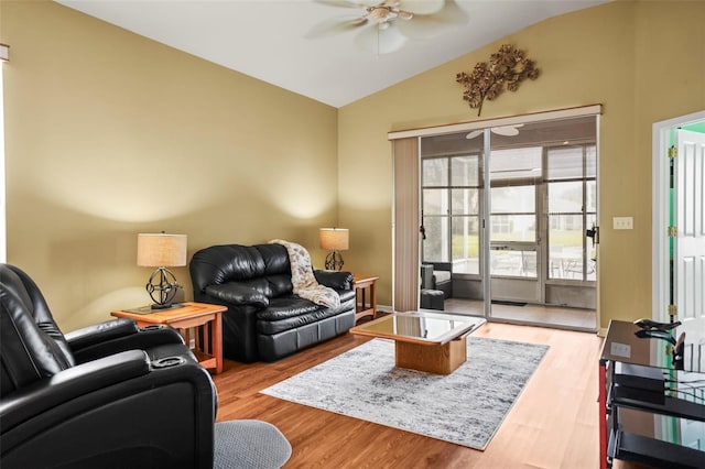 31108 Whitlock Dr, Wesley Chapel, FL 33543 - living area with lofted ceiling, a ceiling fan, and wood finished floors
