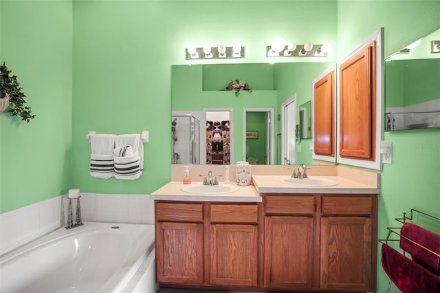 31108 Whitlock Dr, Wesley Chapel, FL 33543 - full bathroom with double vanity, a shower stall, and a bath