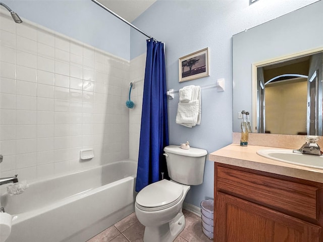 31108 Whitlock Dr, Wesley Chapel, FL 33543 - full bathroom featuring shower / bath combination with curtain, toilet, vanity, tile patterned flooring, and baseboards
