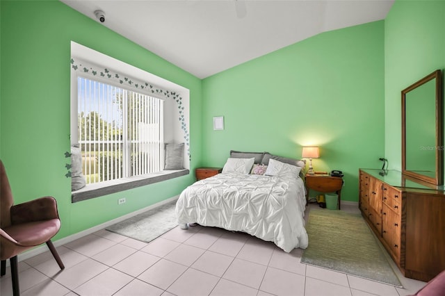 31108 Whitlock Dr, Wesley Chapel, FL 33543 - tiled bedroom featuring baseboards and vaulted ceiling