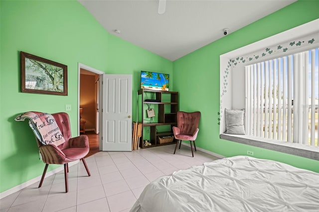 31108 Whitlock Dr, Wesley Chapel, FL 33543 - bedroom with lofted ceiling, multiple windows, baseboards, and tile patterned floors