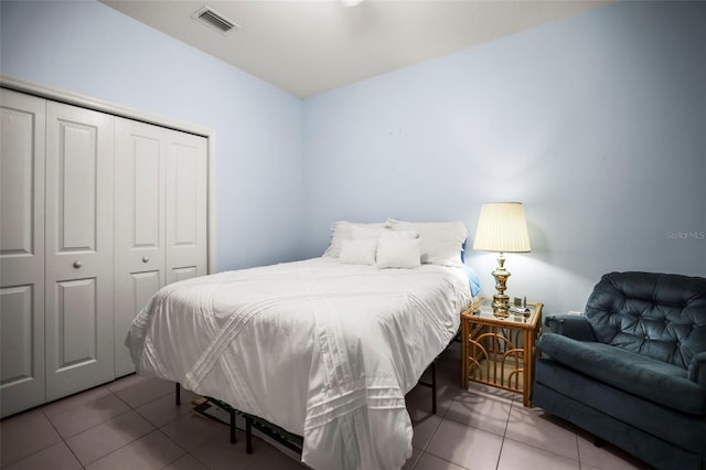 31108 Whitlock Dr, Wesley Chapel, FL 33543 - bedroom with tile patterned floors and a closet