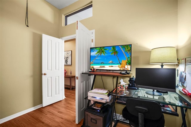 31108 Whitlock Dr, Wesley Chapel, FL 33543 - home office with wood finished floors and baseboards