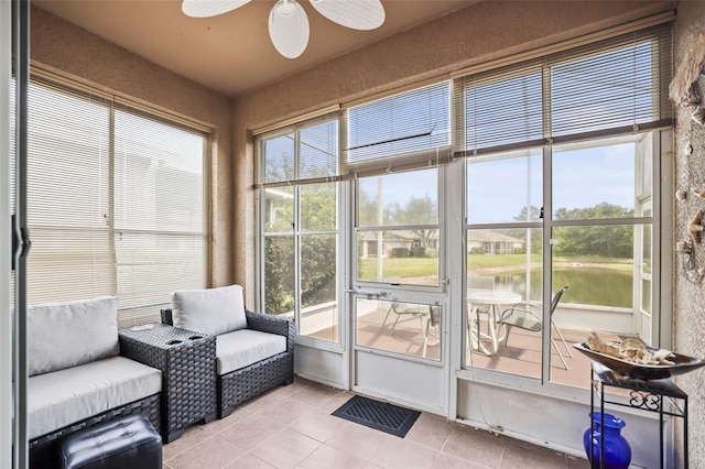 31108 Whitlock Dr, Wesley Chapel, FL 33543 - sunroom featuring a ceiling fan and a water view