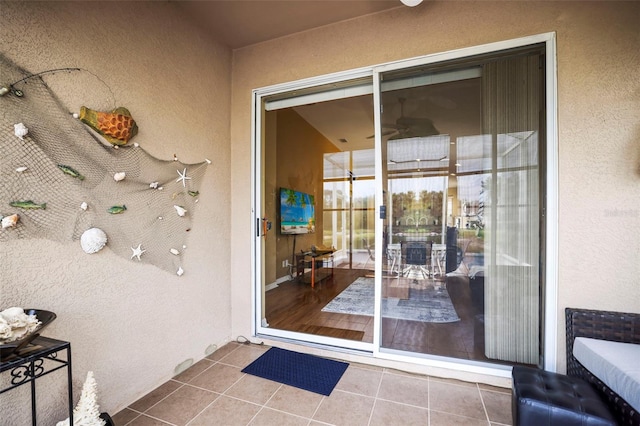 31108 Whitlock Dr, Wesley Chapel, FL 33543 - doorway to property with stucco siding