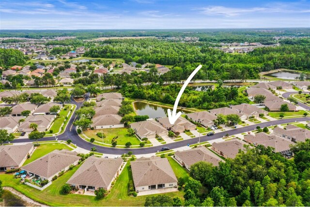 31108 Whitlock Dr, Wesley Chapel, FL 33543 - aerial perspective of suburban area with a nearby body of water