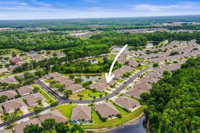 31108 Whitlock Dr, Wesley Chapel, FL 33543 - aerial view of property's location featuring a large body of water and nearby suburban area