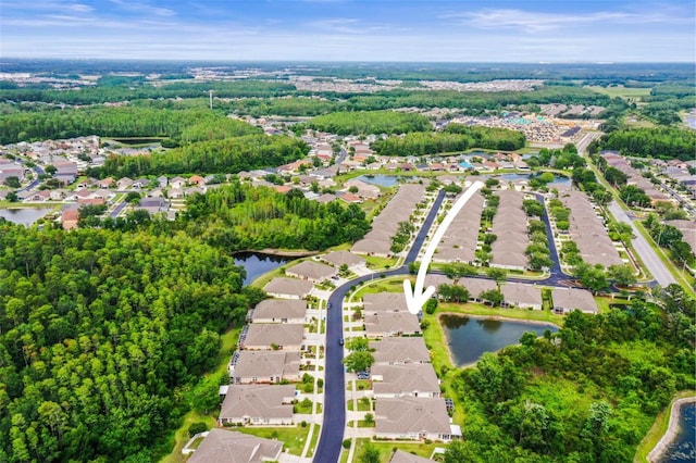 31108 Whitlock Dr, Wesley Chapel, FL 33543 - aerial perspective of suburban area with a nearby body of water
