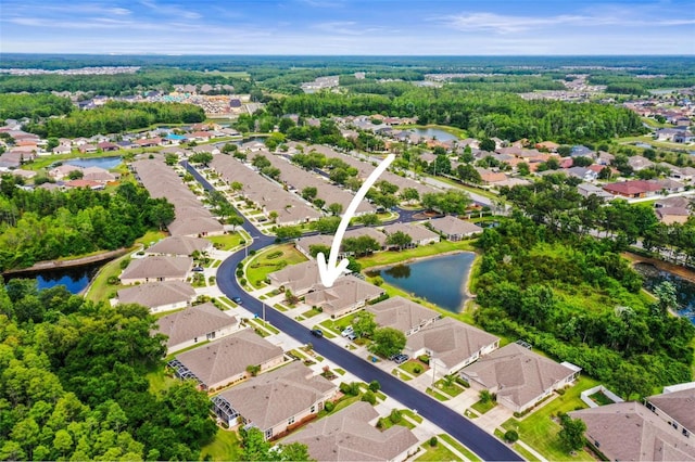 31108 Whitlock Dr, Wesley Chapel, FL 33543 - aerial perspective of suburban area with a large body of water