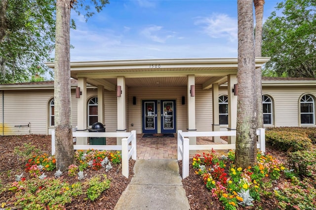 31108 Whitlock Dr, Wesley Chapel, FL 33543 - doorway to property featuring a porch