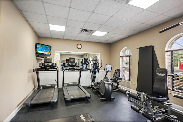 31108 Whitlock Dr, Wesley Chapel, FL 33543 - exercise room featuring a paneled ceiling and baseboards