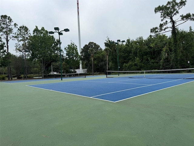 31108 Whitlock Dr, Wesley Chapel, FL 33543 - view of tennis court with community basketball court