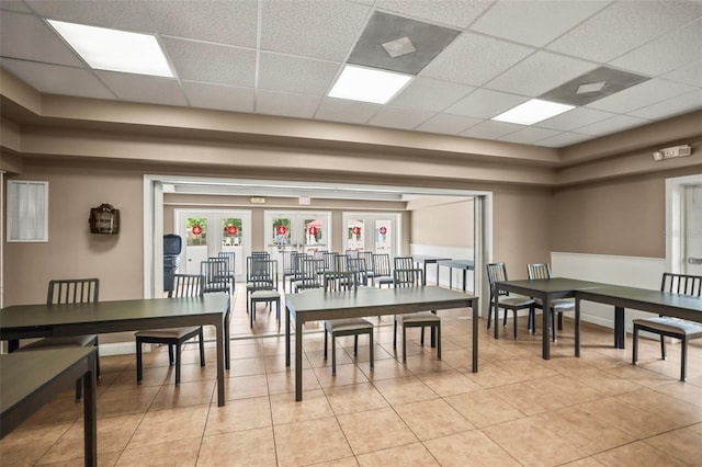 31108 Whitlock Dr, Wesley Chapel, FL 33543 - dining area with a paneled ceiling and light tile patterned floors