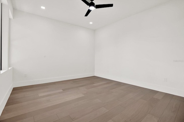 908 W Fribley St, Tampa, FL 33603 - unfurnished room featuring a ceiling fan, wood finished floors, baseboards, and recessed lighting