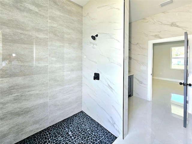 3115 52nd St W, Lehigh Acres, FL 33971 - full bathroom with a marble finish shower and marble look tile flooring