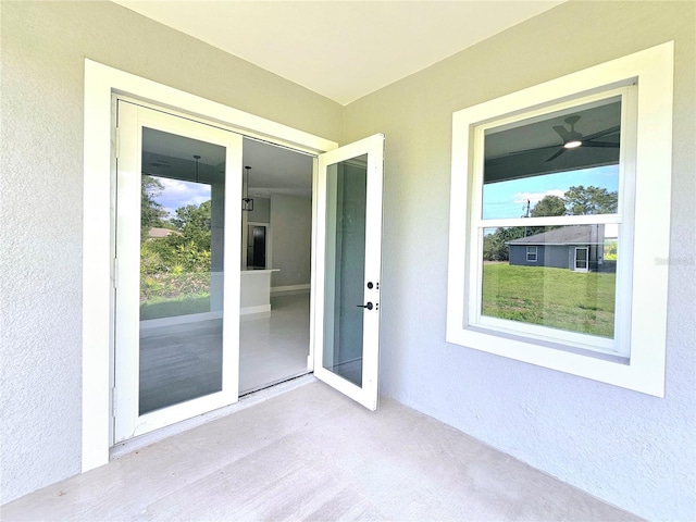 3115 52nd St W, Lehigh Acres, FL 33971 - doorway to property with stucco siding
