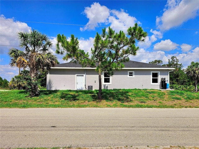 3115 52nd St W, Lehigh Acres, FL 33971 - view of front of home featuring stucco siding