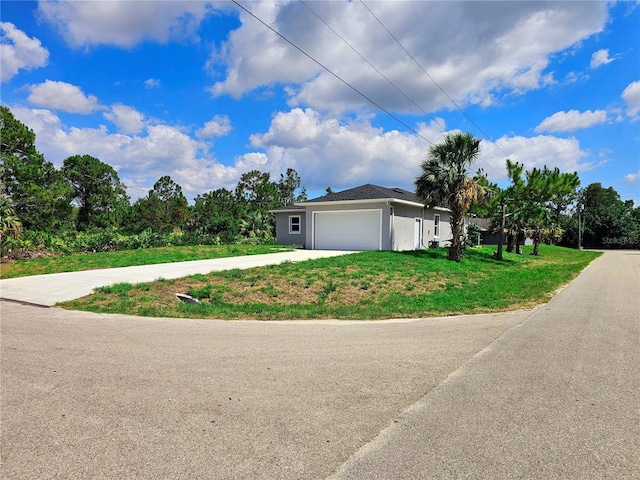 3115 52nd St W, Lehigh Acres, FL 33971 - ranch-style home with driveway, a garage, and stucco siding