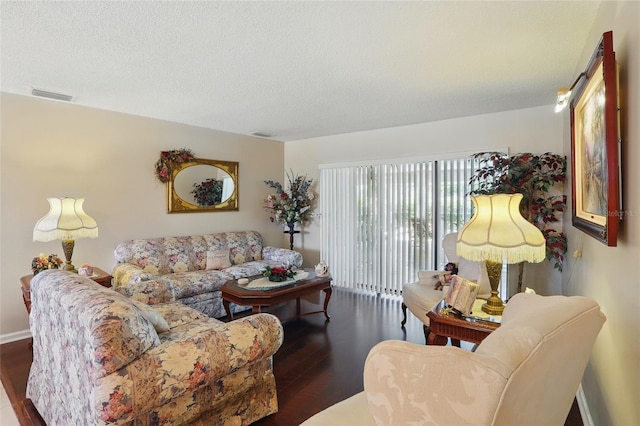 14168 Fennsbury Dr, Tampa, FL 33624 - living room featuring wood finished floors and a textured ceiling
