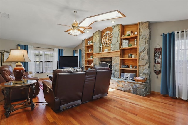 14168 Fennsbury Dr, Tampa, FL 33624 - living room featuring ceiling fan, wood finished floors, and lofted ceiling