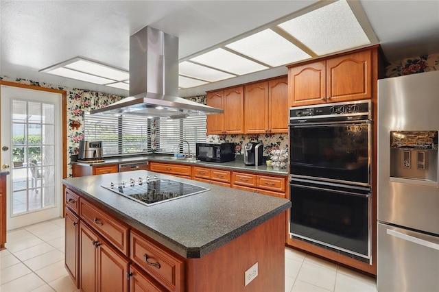 14168 Fennsbury Dr, Tampa, FL 33624 - kitchen featuring black appliances, island exhaust hood, dark countertops, a sink, and brown cabinets