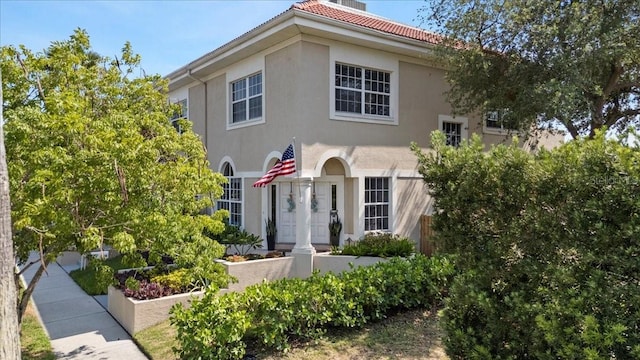 230 Columbia Dr, Tampa, FL 33606 - view of front facade with stucco siding