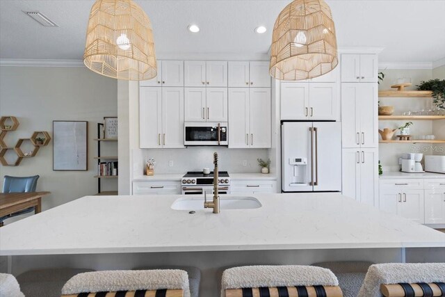 230 Columbia Dr, Tampa, FL 33606 - kitchen with white appliances, crown molding, open shelves, a breakfast bar area, and white cabinets