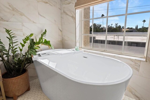 230 Columbia Dr, Tampa, FL 33606 - misc room featuring tile walls and light tile patterned floors