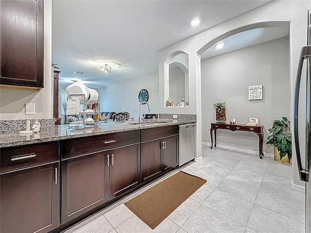 841 Royal Empress Dr, Ruskin, FL 33570 - bathroom featuring double vanity, tile patterned flooring, and baseboards