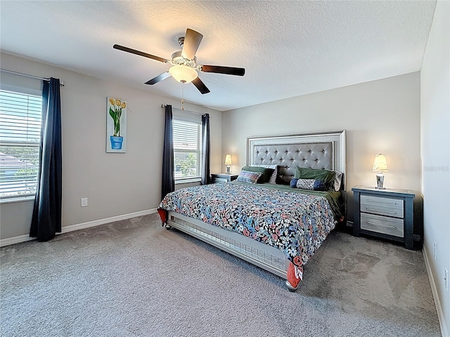 841 Royal Empress Dr, Ruskin, FL 33570 - carpeted bedroom featuring baseboards, a ceiling fan, and a textured ceiling