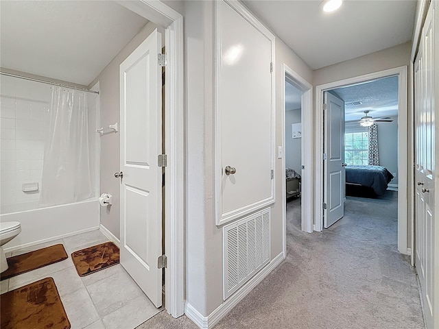 841 Royal Empress Dr, Ruskin, FL 33570 - corridor featuring baseboards and light carpet