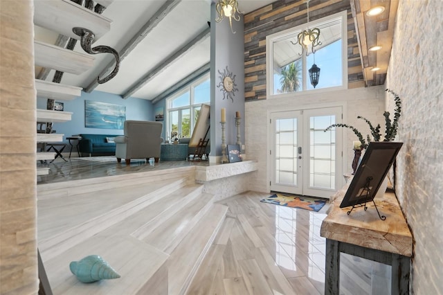 931 Gulf Blvd, Belleair Beach, FL 33786 - entryway with high vaulted ceiling, french doors, and beamed ceiling