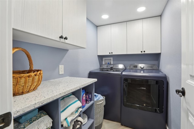 931 Gulf Blvd, Belleair Beach, FL 33786 - laundry room with cabinet space, washing machine and clothes dryer, and recessed lighting