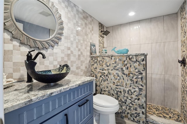 931 Gulf Blvd, Belleair Beach, FL 33786 - full bathroom with walk in shower, vanity, toilet, backsplash, and recessed lighting