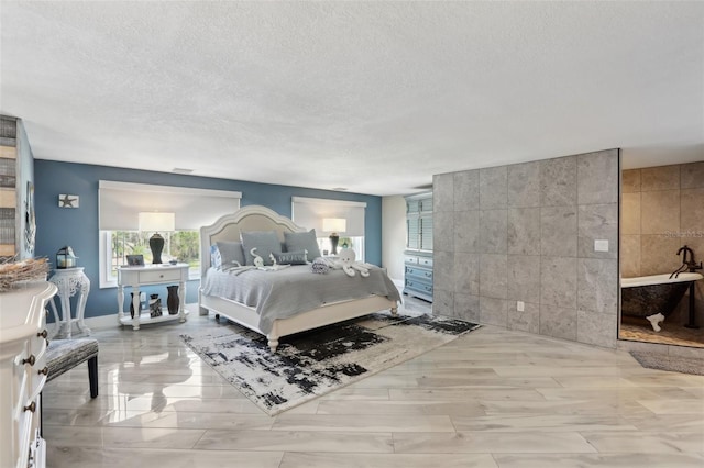 931 Gulf Blvd, Belleair Beach, FL 33786 - bedroom with tile walls, a textured ceiling, and wood finished floors
