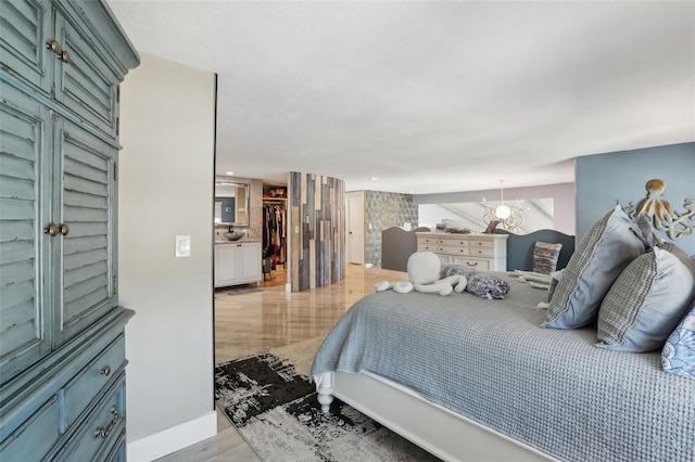 931 Gulf Blvd, Belleair Beach, FL 33786 - bedroom featuring a spacious closet and baseboards