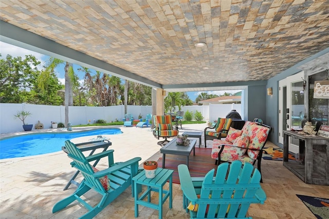 931 Gulf Blvd, Belleair Beach, FL 33786 - fenced backyard with an outdoor living space and a patio