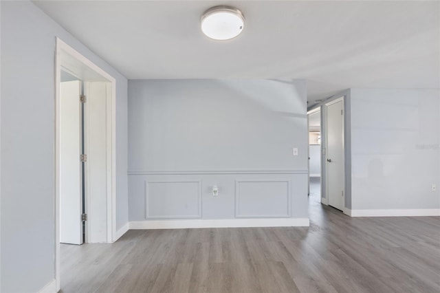 5027 Overton Dr, New Port Richey, FL 34652 - unfurnished room with wood finished floors