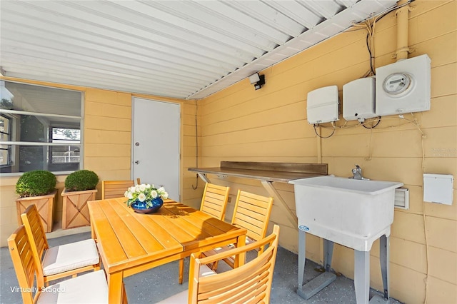 5027 Overton Dr, New Port Richey, FL 34652 - view of patio / terrace featuring outdoor dining area and a sink