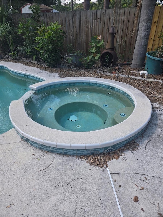 1831 Pasadena Dr, Dunedin, FL 34698 - view of pool featuring a pool with connected hot tub