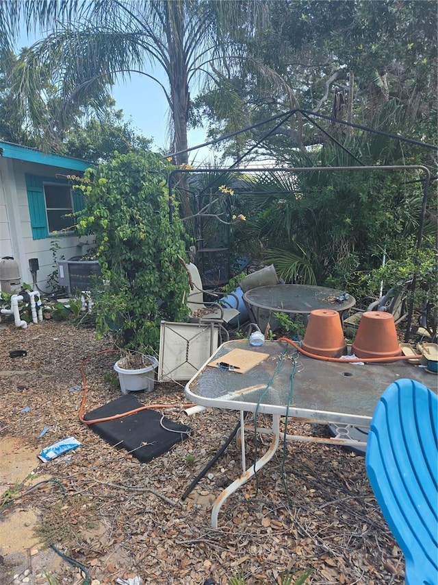 1831 Pasadena Dr, Dunedin, FL 34698 - view of yard featuring outdoor dining area