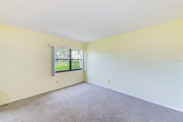 14130 Rosemary Ln Unit 4115, Largo, FL 33774 - unfurnished room featuring light carpet and baseboards