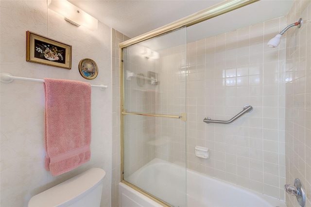 14130 Rosemary Ln Unit 4115, Largo, FL 33774 - bathroom with toilet and shower / bath combination with glass door