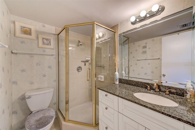 14130 Rosemary Ln Unit 4115, Largo, FL 33774 - full bath with vanity, a stall shower, toilet, and wallpapered walls