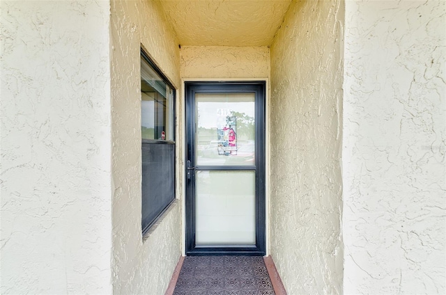 14130 Rosemary Ln Unit 4115, Largo, FL 33774 - view of exterior entry with stucco siding